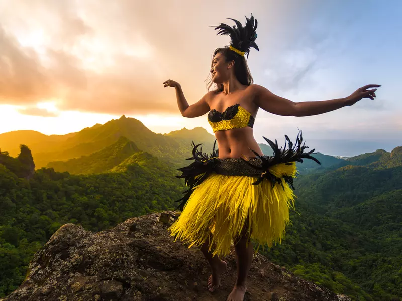 Cook Island woman dancing on the mountain 
