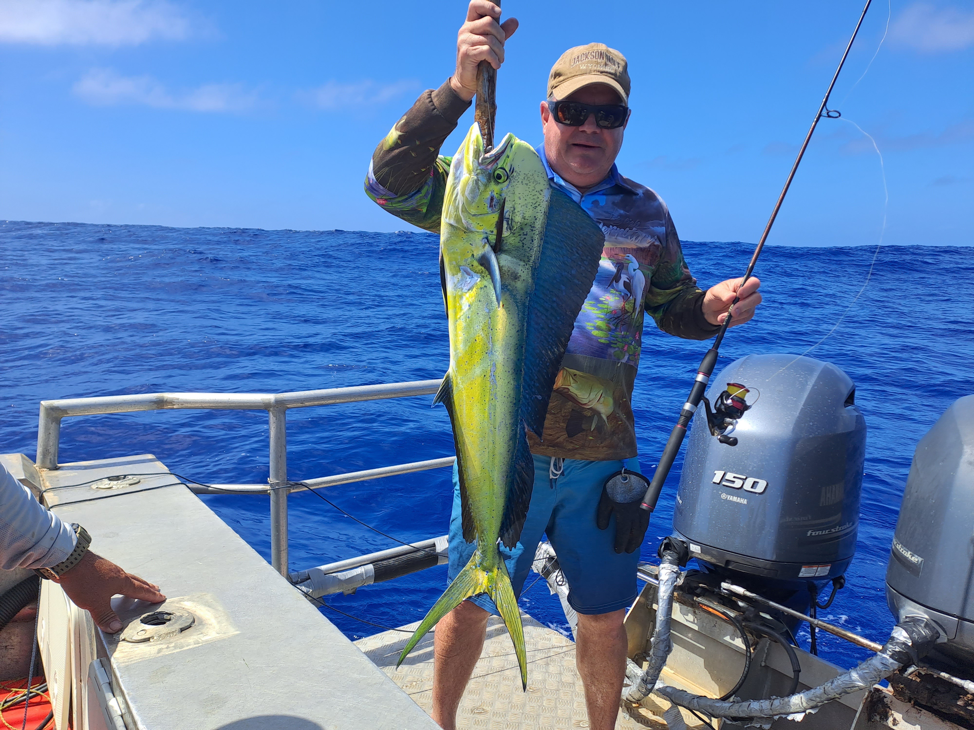 Bonefish charter - fisherman holding catch