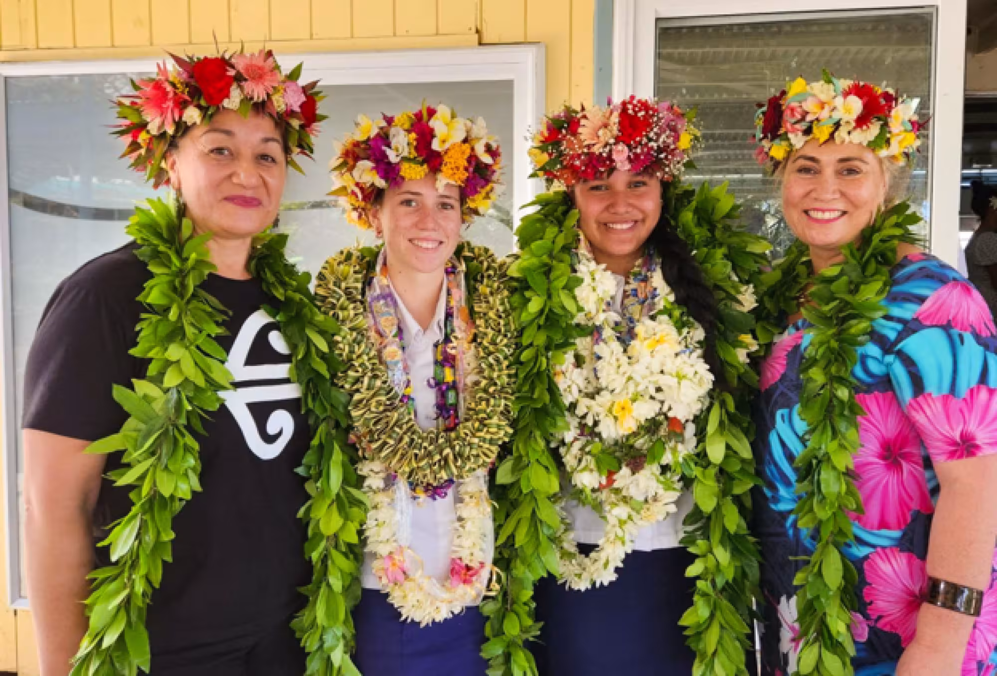 2023 Scholarship recipients Rakiki Brown and Kubethreana Taripo with Addrienne Hosking-Tinirau, of Air New Zealand and Karla Eggelton, CEO of Te Mato Manava Tūroto – Cook Islands Tourism Corporation