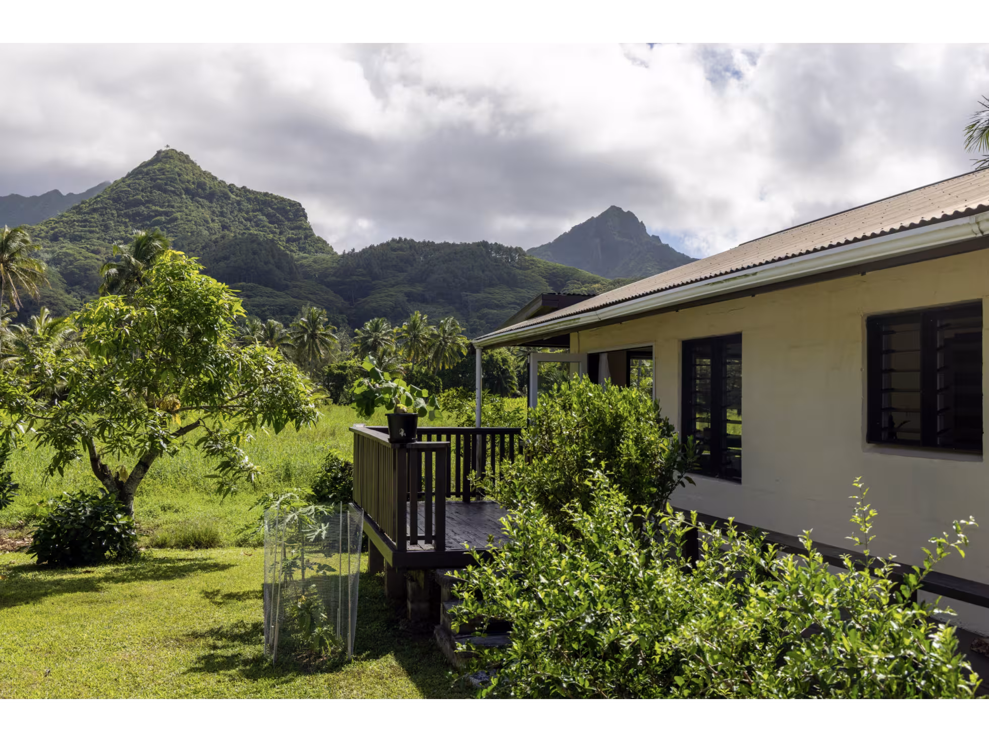 The villa with mountains in the background